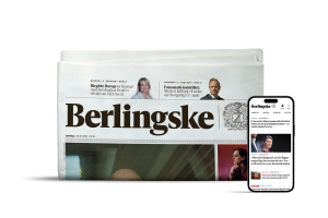 Billede af en mobil som besøger berlingske.dk og Berlingske som avis